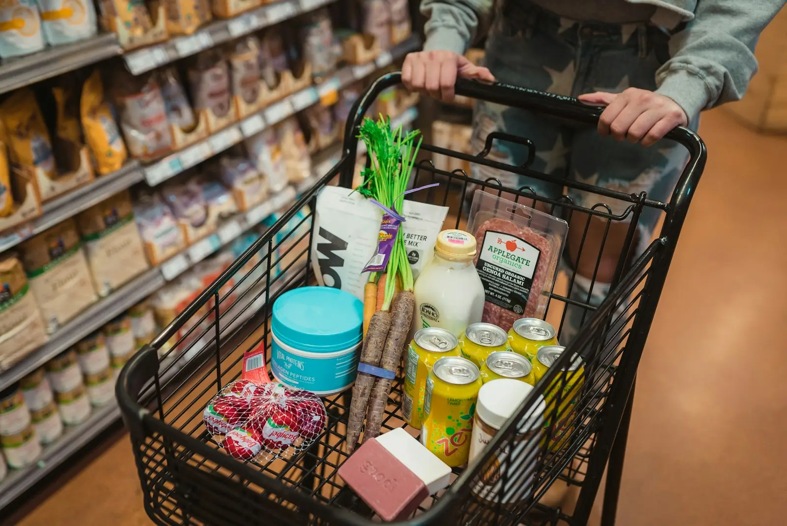 A shopping cart in a store aisle